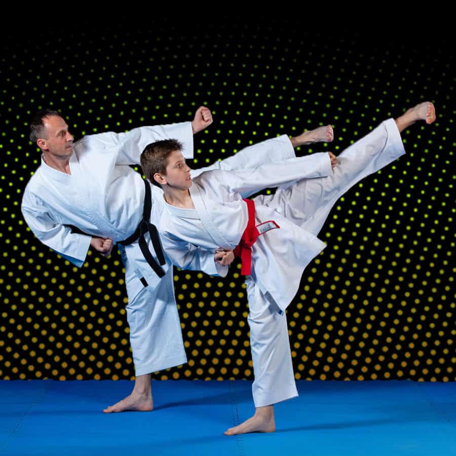 Martial Arts Lessons for Families in Escondido CA - Dad and Son High Kick